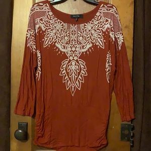 Dolman top with fitted waist. 3/4 sleeves, small.